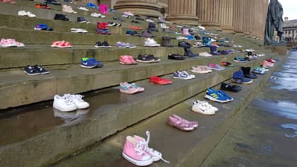 This ​Charity Placed 226 Pairs Of Shoes On Steps For Every Child Lost To Suicide