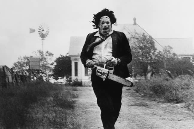 The image of Leatherface running from the Victorian house has become one of horror's most iconic shots (Credit: Bryanston Distributing Company) 