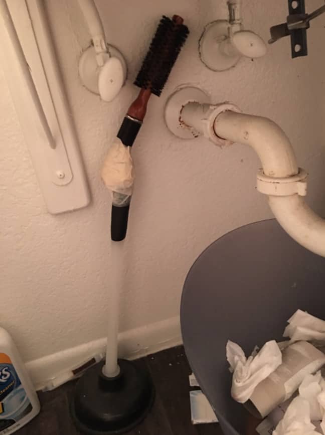A toilet brush extension... handy (Credit: Twitter)