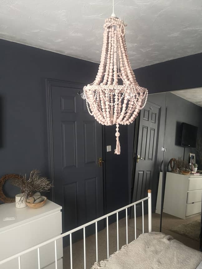 Her pasta chandelier now takes pride of place above her bed (Credit: Kennedy)