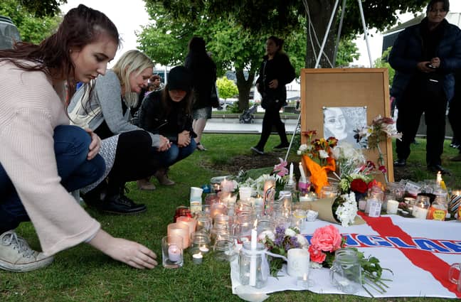 People light candles during a vigil for Grace Millane in Cathedral Square in Christchurch, New Zealand, shortly after her body was discovered. (Credit: PA)