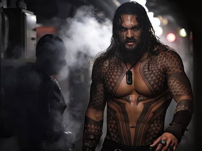 Jason Momoa plays Aquaman in the DCEU and he looks completely different compared to his Baywatch days (Credit: Warner Bros.)