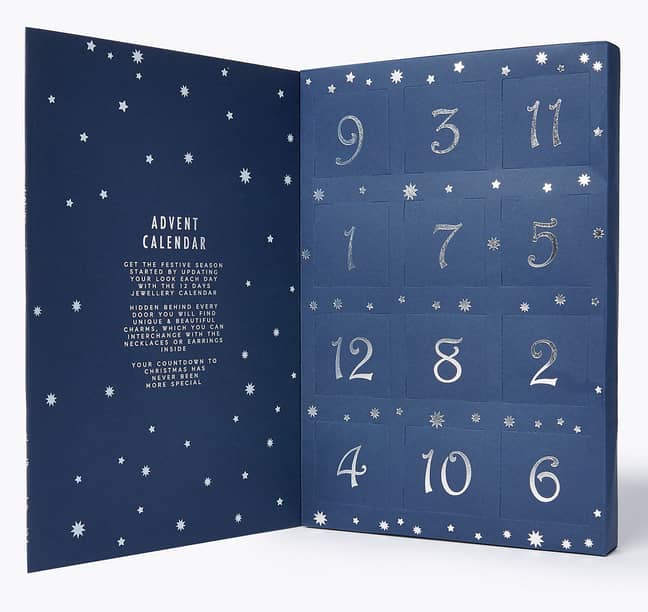 The pieces are housed in an inky-blue box patterned with silver stars. (Credit: Marks &amp; Spencer's)