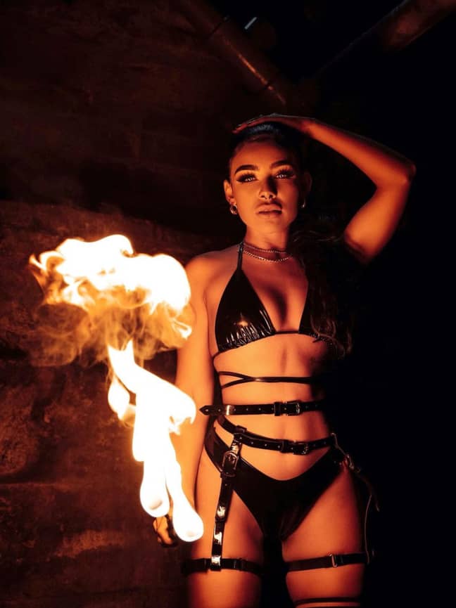 Alexis Bailey is a professional fire-eater and aerial dancer (Credit: Instagram/alexis.baileyyx)