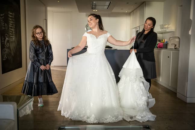 Tracy tries on a bridal gown (Credit: BBC)