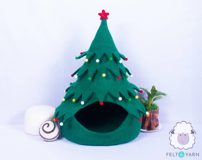 Your cat will supposedly be drawn to the tree bed because of the Lanolin oil found in sheep's wool. (Credit: Felt &amp; Yarn/Etsy)