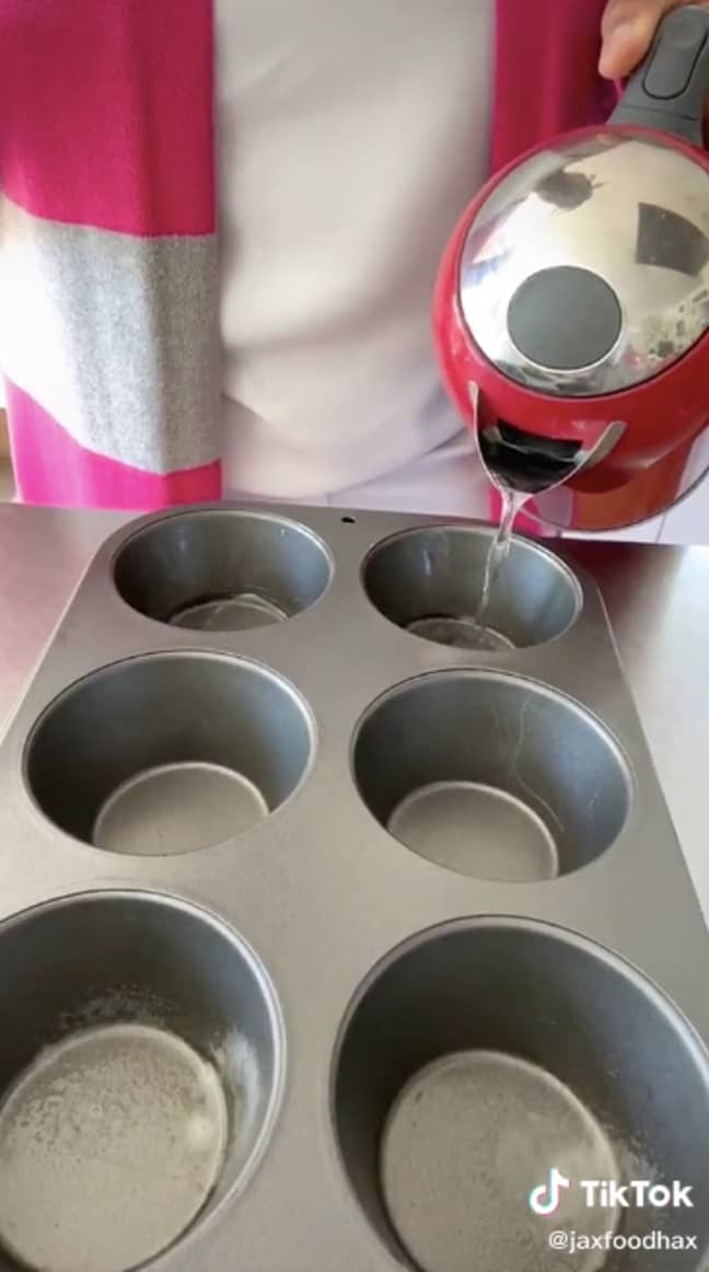 Add 1cm water to each compartment before cracking in your egg (Credit: TikTok / @JaxFoodHax)