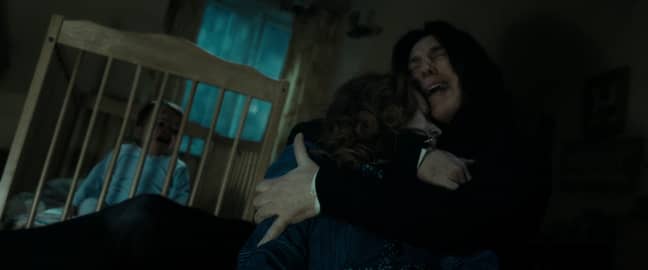 Snape tenderly cradles Lily's body after she is murdered (Credit: Warner Bros)