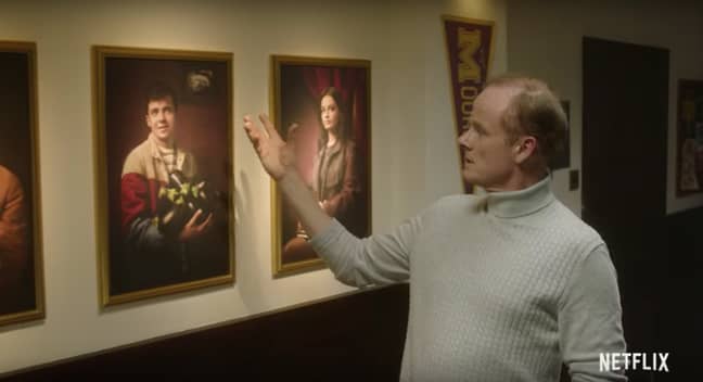 Mr Groff examines portraits of the Moordale students (Credit: Netflix)