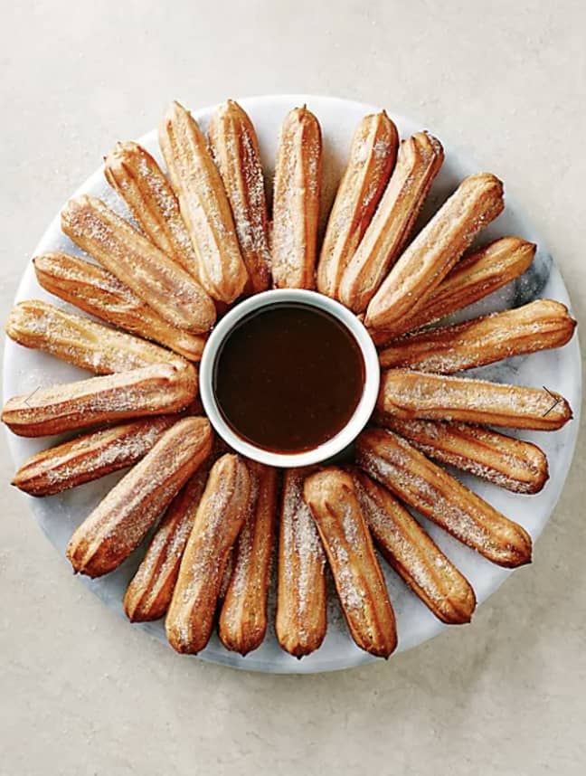 You can also buy churros from Marks &amp; Spencer that can be heated in the oven at home (Credit: Marks &amp; Spencer)