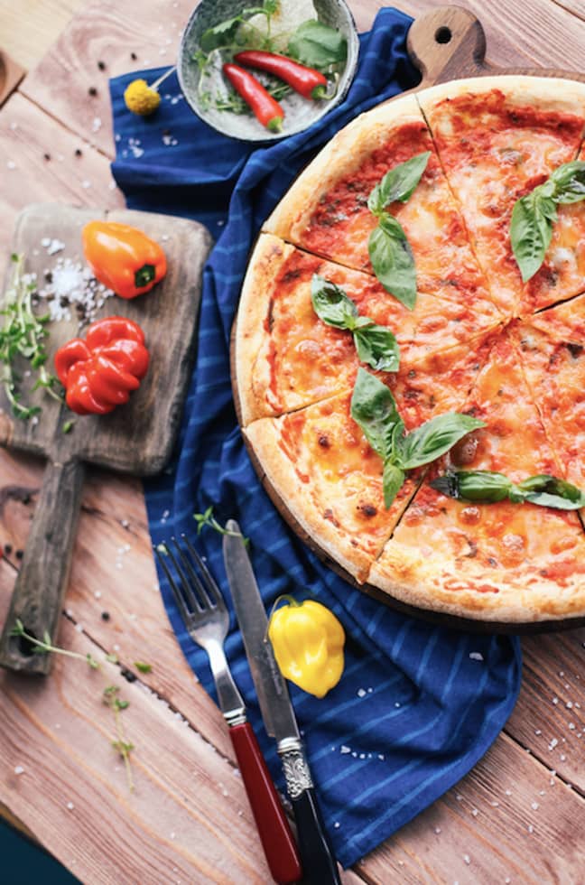 A traditional Italian pizza has just three toppings (Credit: Unsplash)