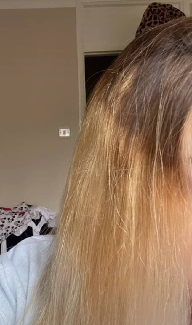 The poor job has left the poor victim with a large brown chunk at the top of her head (Credit: TikTok)