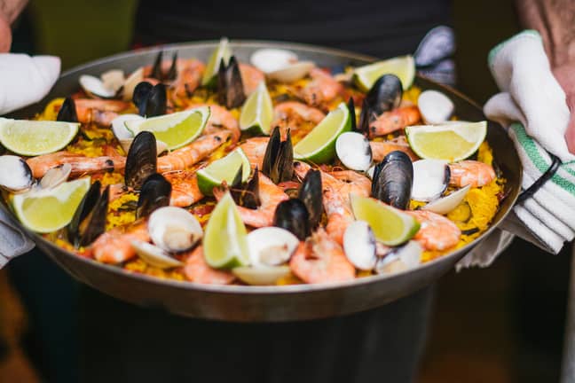 She was served a half-portion of paella at the dinner party (Credit: Unsplash)