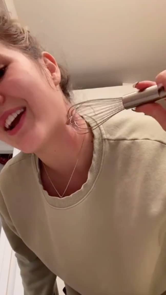She revealed how to remove a hickey with a whisk (Credit: TikTok/@mads.larocque)