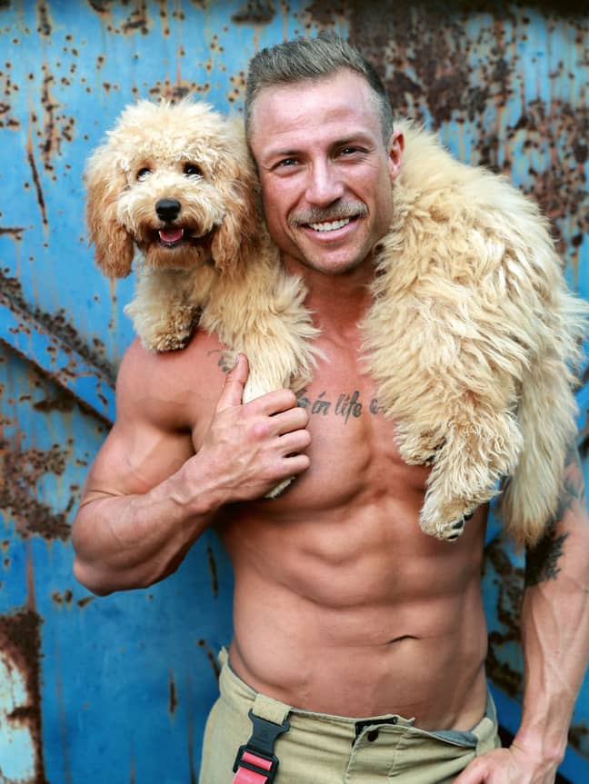 Have you ever seen a cuter man/dog combo? (Credit: Australian Firefighters Calendar)