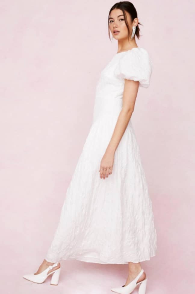This dress is simple but understated with trendy puffy sleeves (Credit: Nasty Gal) 
