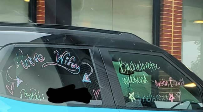 The car had the bride's PayPal number on so people could donate to her wedding (Credit: Reddit)