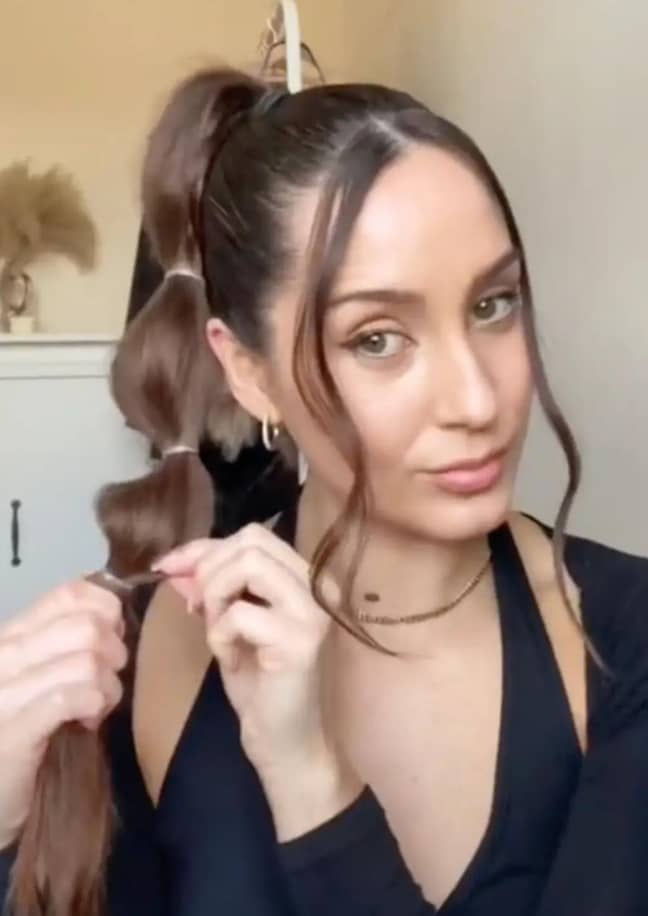 Get elastics out of your hair without causing damage. (Credit: TikTok/@amberrosepeakehair)