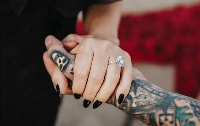 Her partner, Travis Barker, worked with Lorraine Schwartz to create the bespoke, oval engagement ring for his then-fiancée (Kourtney Kardashian Instagram).