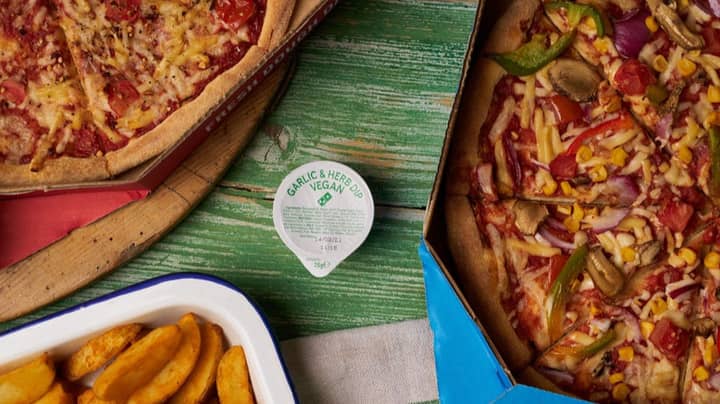 PSA: People Are Calling Domino's New Vegan Garlic And Herb Dip A 'Game Changer'