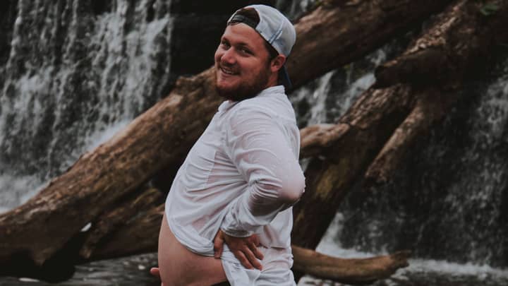 Dad-To-Be Poses With Beer Belly After Wife Was Too Sick To Attend Maternity Shoot